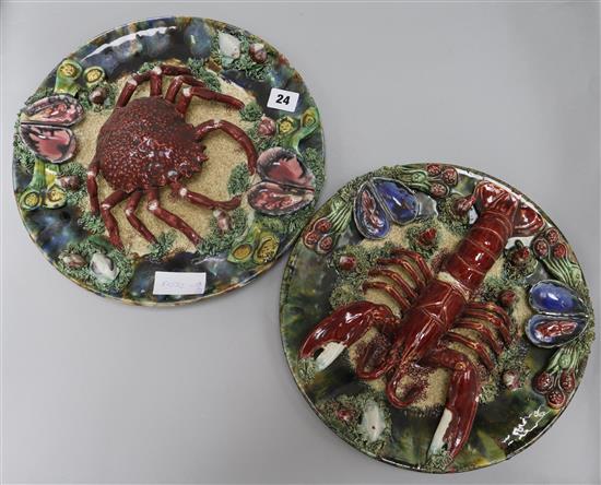 Two Palissy style dishes, 34cm.